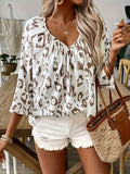 BLUSA CON ESTAMPADO LEOPARDO